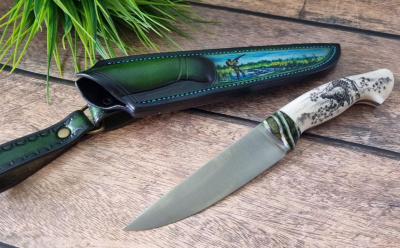Нож "Легионер": сталь - Bohler S390;цельнометаллический -  рукоять элфорин(слоновая кость), скримшоу(резьба по кости), вставка зуб мамонта,формовочные ножны